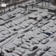 Snow Covered Cars, by Des Brownlie