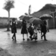 School Kids in the Rain, by Lavi Dhurve