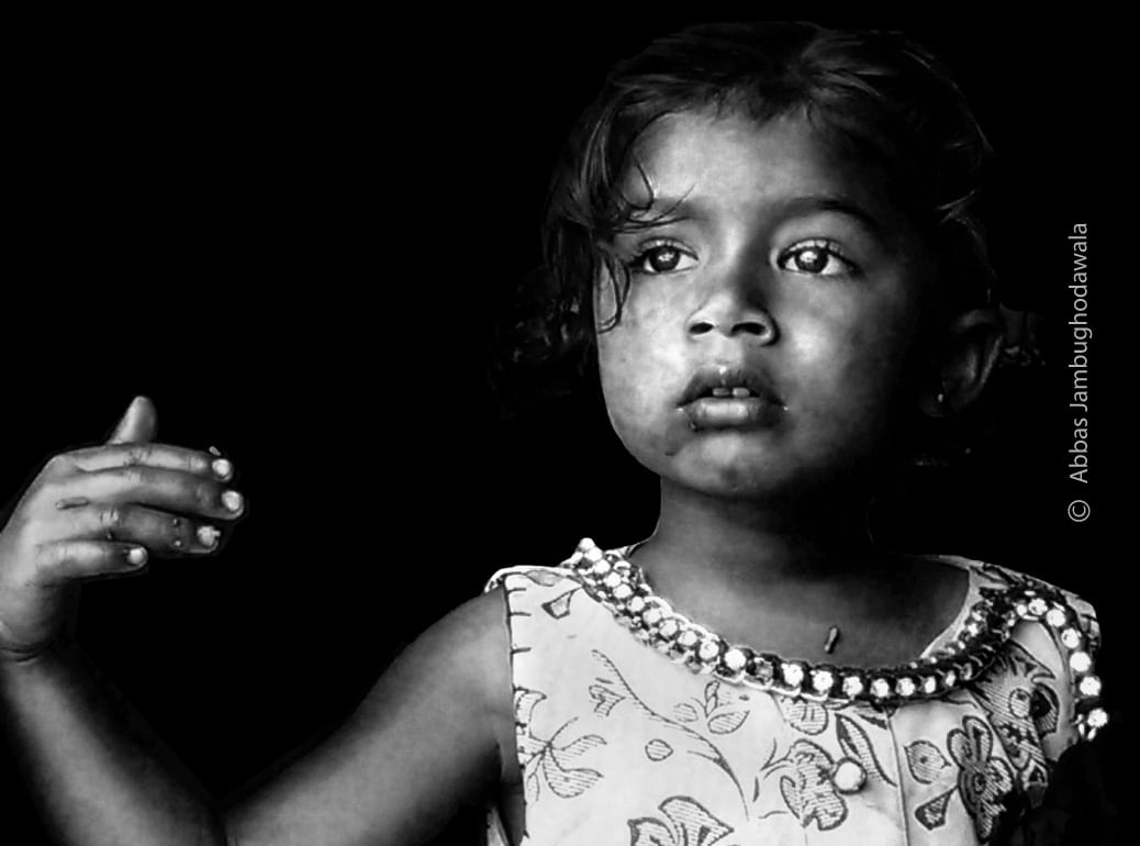 Enjoying Her Chips by Abbas Jambughodawala