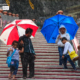 A Candid Moment at Batu Caves by Montasir Khandker