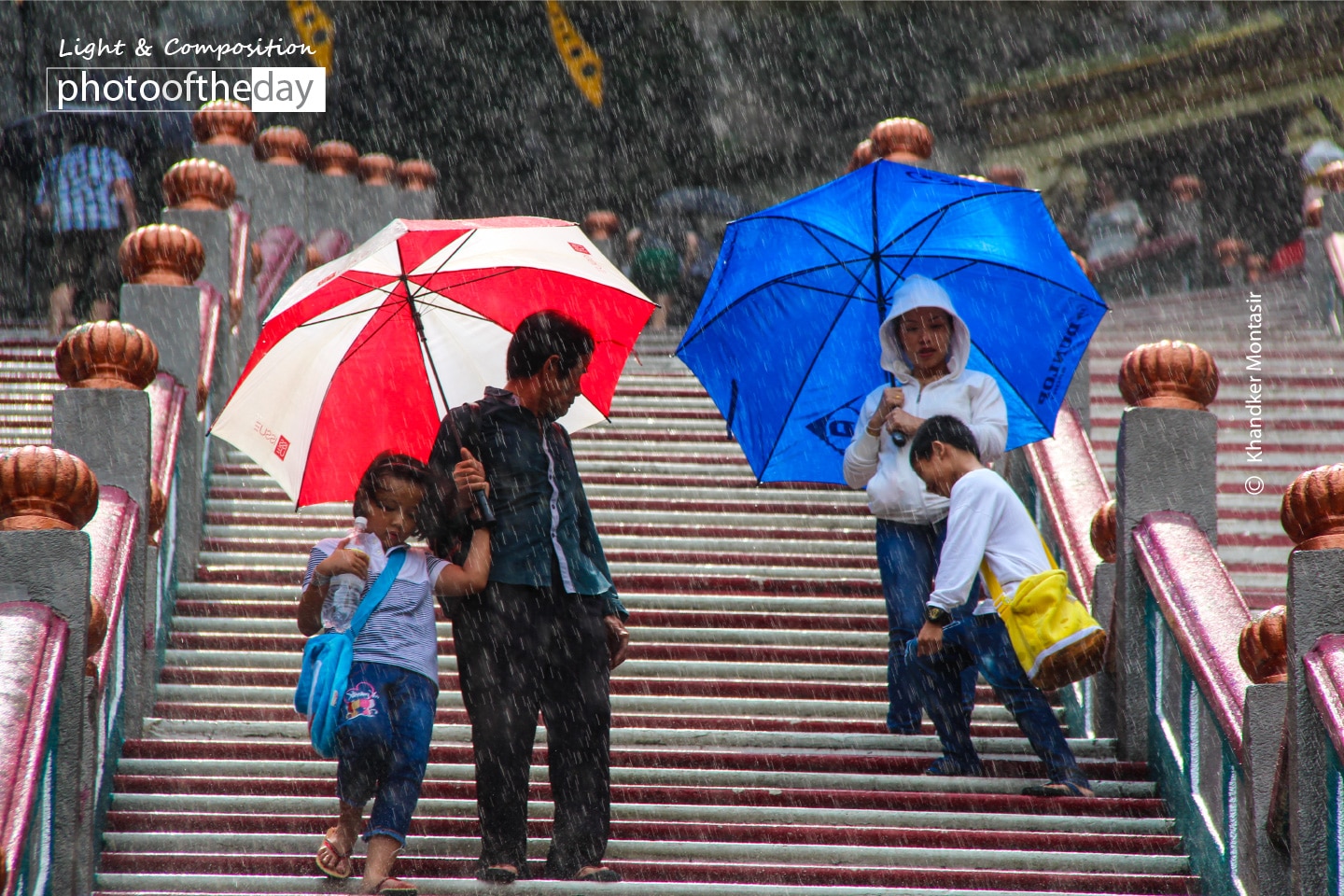 A Candid Moment at Batu Caves by Montasir Khandker