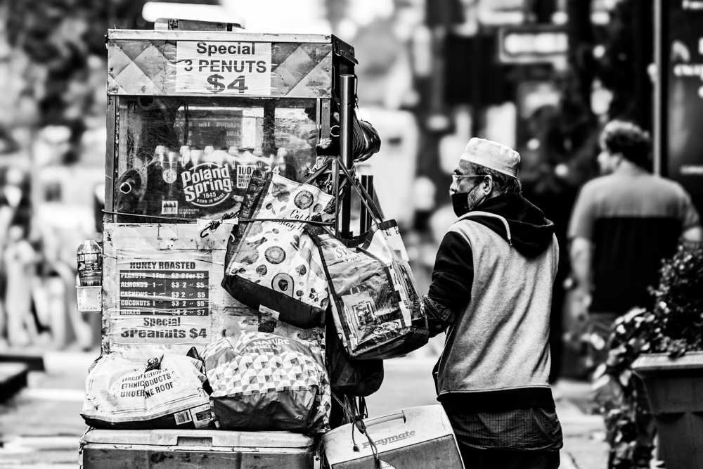 A Street Vendor in the Time Square by Jose Juniel Rivera-Negron