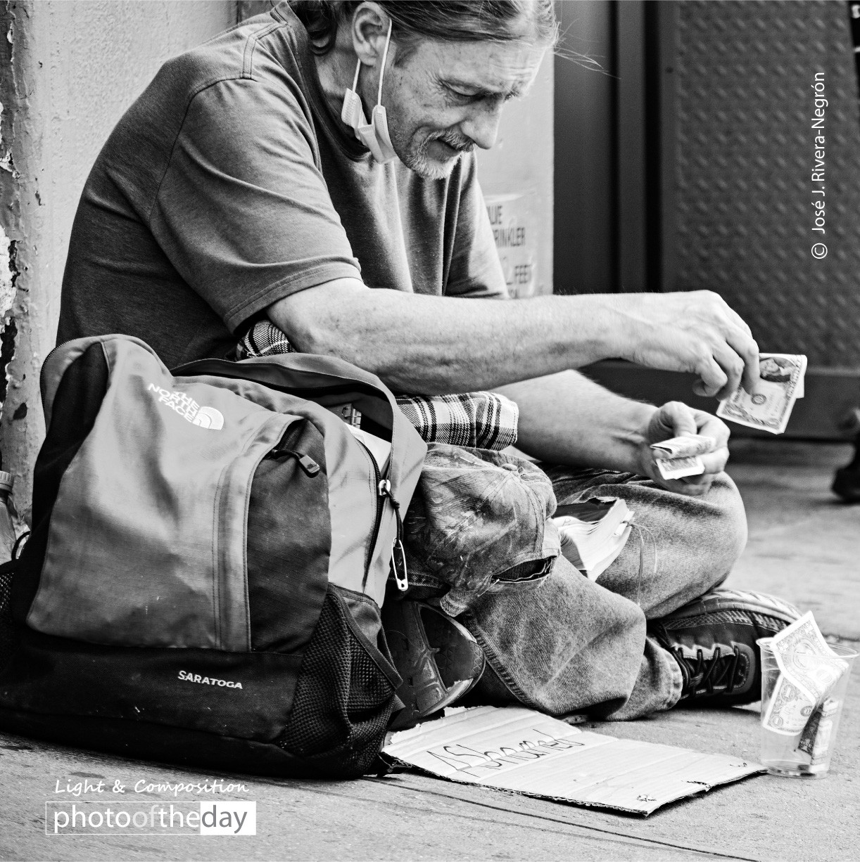 A Homeless on the Sidewalk by Jose Juniel Rivera Negron