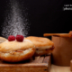 Caramel Sauce Doughnut with Powdered Sugar by Rodrigo Aliaga