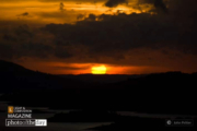 Sunset over Lago Arenal by John Peltier