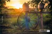 Sunset Wagon Wheel Mail Box by Zara Otaifah